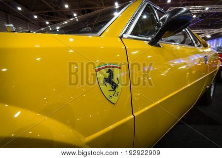 MAASTRICHT NETHERLANDS - JANUARY 14 2016: Fragment of a sports car Ferrari 308 GT4 Dino 1977. International Exhibition InterClassics & Topmobiel 2016