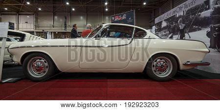 MAASTRICHT NETHERLANDS - JANUARY 14 2016: Sports car Volvo P1800 1964. International Exhibition InterClassics & Topmobiel 2016