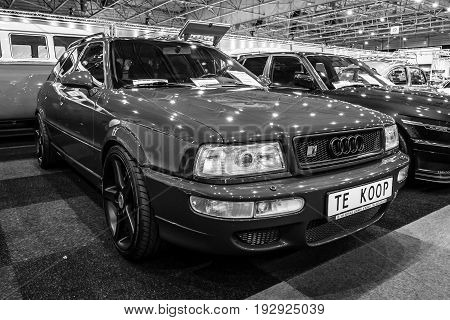 MAASTRICHT NETHERLANDS - JANUARY 14 2016: Compact executive car Audi RS 2 Avant 1989. Black and white. International Exhibition InterClassics & Topmobiel 2016