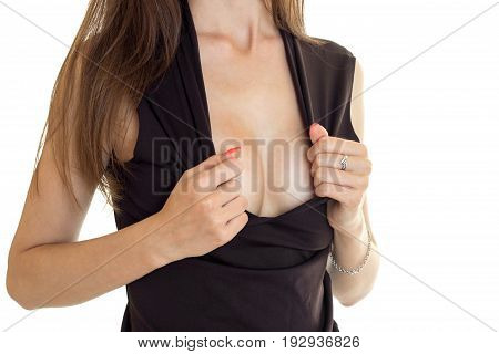 girl in black sweater with big neckline shows off her chest close-up isolated on white background