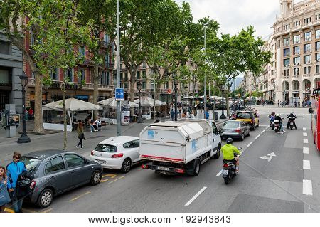 BARCELONA, SPAIN - MAY 2017: Street traffic at Barcelona town, Spain