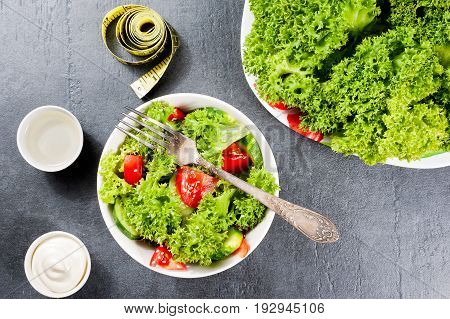 Vegetables Salad. Delicious Vegetarian Food Or Diet Concept On Dark Background