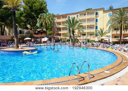 MALLORCA SPAIN - MAY 29: The tourists enjoiying their vacation in luxury hotel on May 29 2015 in Mallorca Spain. Up to 60 mln tourists is expected to visit Spain in year 2015.