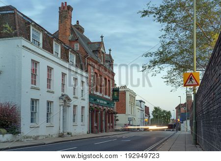 Winchester, UK. 25th June 2017. The streets of Winchester City centre at dusk on a quiet, warm summer's evening.