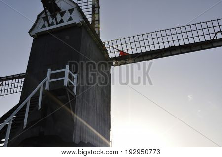 Belgian Mill with sunny blue sky background