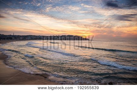 Beautiful moment of sunrise at famous Bondi beachwhere is people come to surfing. Photographed on 2 April 2016.