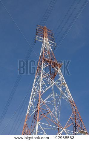 The high-voltage tower in the sky background