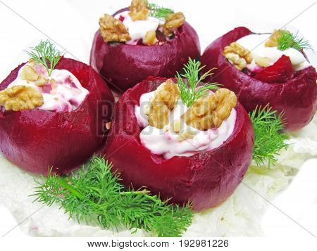 stuffed beetroot vegetable with parsley and fennel on the plate