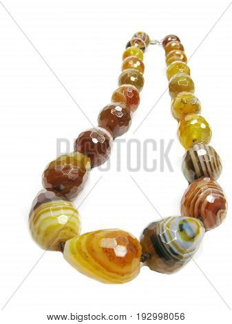 yellow agte mineral beads jewelry isolated on white background