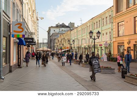 Moscow, Russia- 22 September 2014: View Of The Buildings At Rozhdestvenka Street. People Walking On 