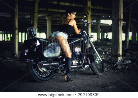 Strong Independent , Self-sufficient Girl With Male Hobby On Chopper Motorcycle, International Women