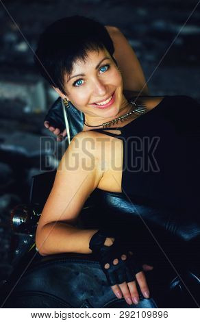 Strong Independent , Self-sufficient Girl With Male Hobby On Chopper Motorcycle, International Women