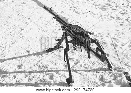 Black And White Image Of A Large-caliber Machine Gun Utes On The Firing Position
