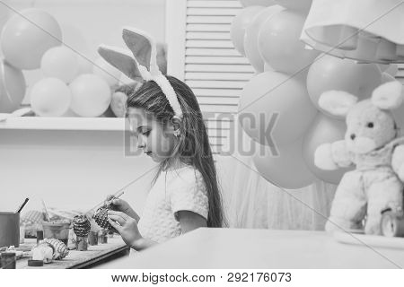 Daughter Paint Handmade Egg At Party Balloons. Gaughter Or Little Girl Kid Paint Easter Eggs