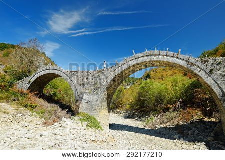 Plakidas Arched Stone Bridge Of Zagori Region In Northern Greece. Iconic Bridges Were Mostly Built D