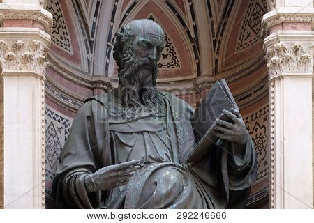 FLORENCE, ITALY - JANUARY 09, 2019: Saint John the Evangelist by Baccio da Montelupo, Orsanmichele Church in Florence, Tuscany, Italy