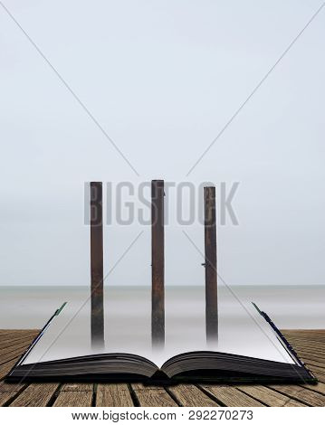 Landscape Image Of Derelict Victorian West Pier At Brighton In West Sussex  In Pages Of Open Book, S