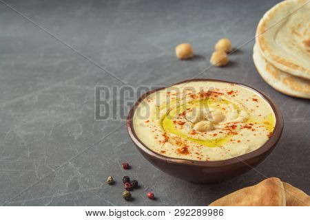 Hummus Bowl With Chickpeas, Pita Bread, Spices, Olive Oil. Middle Eastern Snack, Healthy Eating Conc