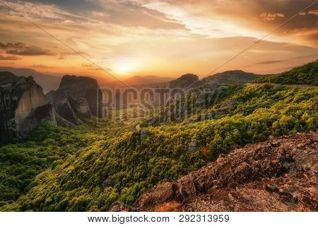 Monastery Meteora Greece. Stunning Spring Panoramic Landscape At Sunset. View At Mountains And Green
