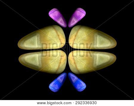 Figures Laid Out By Children From Multi-colored Pebbles. Figure From Multi-colored Stones. Stone Fig