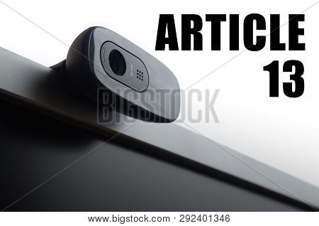 A Modern Web Camera On Monitor And Article 13 Inscription