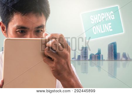 Man Holding Tablet For Blurred Bokeh Background E-shopping Marketing Digital, Consumer Purchase Shop