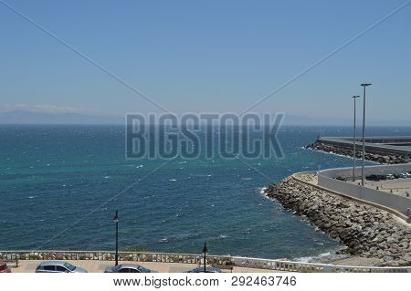Maritime Port With Views Of Africa At Tariff Background. Nature, Architecture, History, Street Photo