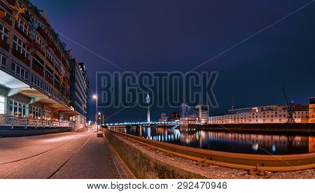 Duesseldorf, Germany - June 29, 2016: Blue Hour And Artificial Light Create A Scenic Atmosphere At M