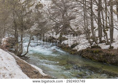 Arazas River In Ordesa Y Monte Perdido National Park With Snow.