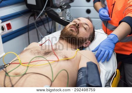 Ecg Electrodes On Patient Chest In Ambulance
