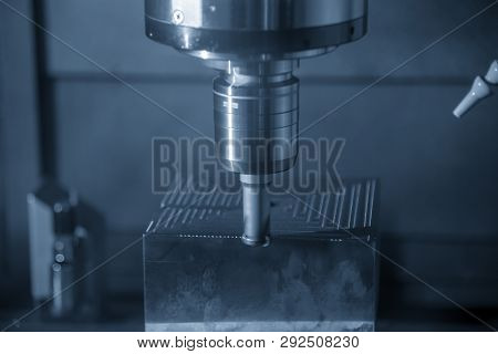 The  Operation Of Cnc Machining Center Cutting The Mold Parts .the Cnc Milling Machine Rough Cutting
