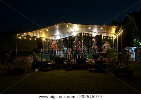 Oahu - March 11, 2017:  Rock Band Roxotica, Featuring Guitarist, Bassist, Violinist, And Drummer Pla