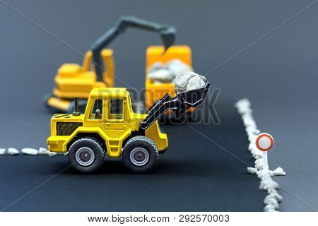 Diorama Road Construction With Yellow Construction Machinery Models
