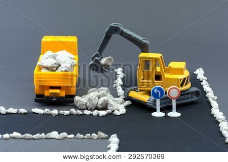 Diorama Road Construction With Yellow Construction Machinery Models