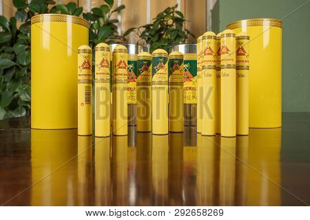 Santa Clara, Cuba - March 19 2019: Montecristo Cuban Cigars And Their Snuffbox On A Table