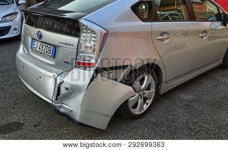 A Toyota Prius In Metallic Gray Was Damaged.