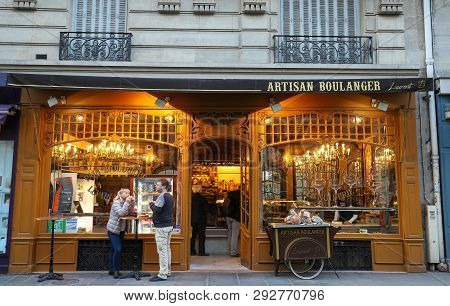 Paris, France-30 March, 2019 : The Traditional French Bakery Shop A La Fontaine Du Mars Located Near