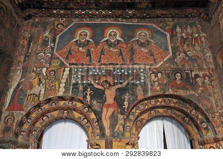 GONDAR, ETHIOPIA - MARCH 3, 2019: religious ceiling and wall paintings in Debre Birhan Selassie church