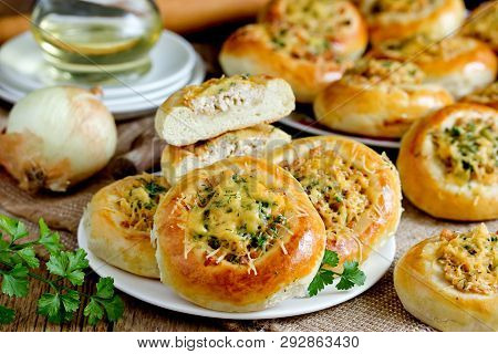 Homemade Dinner Buns Stuffed With Minced Meat And Cheese. Round Meat Patties From Yeast Dough For Sn