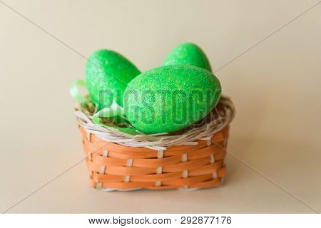 Easter Big Green Eggs In A Basket On Beige Background. Easter Concept. Spring Time.