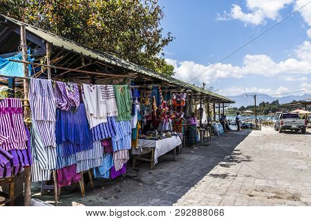 Santiago Atitlan, Lake Atitlan, Guatemala - March 8, 2019: Stall Selling Mayan Textiles & Souvenirs 