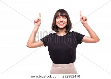 Horizontal Shot Of Successful Friendly Looking Young Dark Haired Woman With Bright Make Up Exclaimin