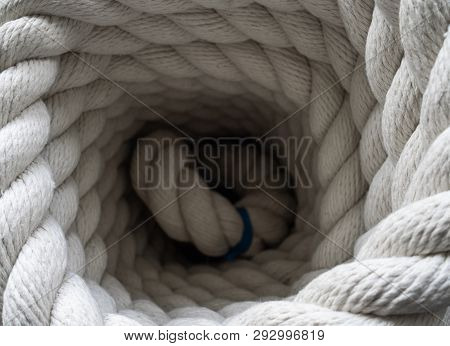 The Thick Rope Twisted In A Roll. The Top View On A Rope Spiral. The Rope Curtailed Into A Circle. T