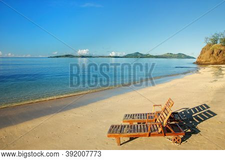 Two Sun Chairs On A Tropical Beach, Nacula Island, Yasawas, Fiji