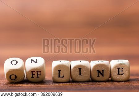 Online And Offline Printed On Wooden Cubes