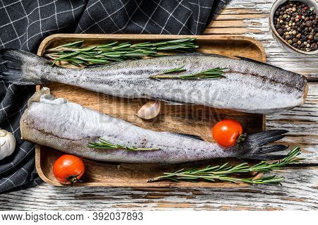 Whole Fish Pollock. Raw Seafood. White Background. Top View