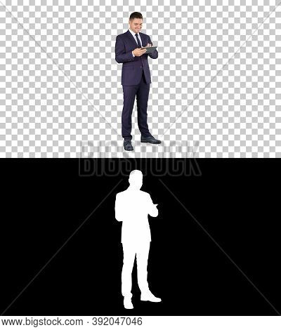 Businessman Reading Or Working On A Digital Tablet, Alpha Channe
