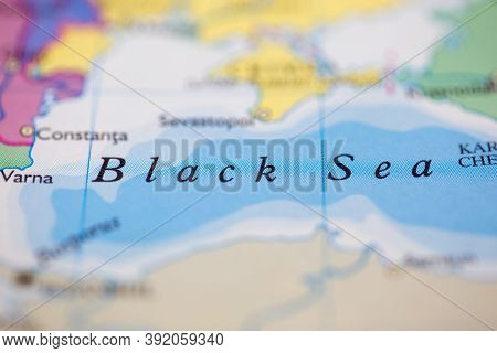 Shallow Depth Of Field Focus On Geographical Map Location Of Black Sea Off Coast Of Turkey On Atlas