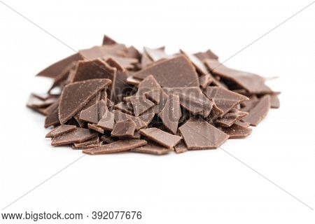 Grated dark chocolate. Chocolate flakes isolated a on white background.