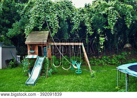 Dangerous Live Downed Power Line Draped Across Trampoline And Backyard Playground